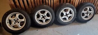Alu kola Alutec 15" 4x100 7J ET37 střed 64.1 mm