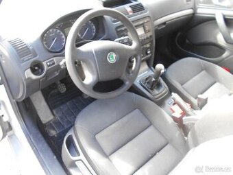 nd z škoda octavia 2 1.6tdi 77kw bílá stříbrná sahara 9201