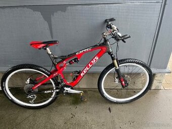 Kellys ORC - carbon celoodpružené MTB