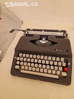 Kufříkový psací stroj zn.Chevron