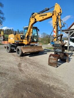 Kolovy bagr rypadlo liebherr 309