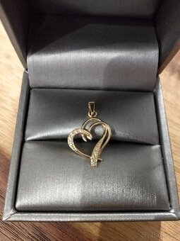 Zlatý přívěsek 585/1000  1,21g