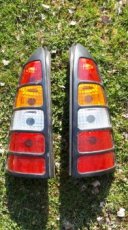 zadní světla opel astra kombi G + roleta kufru + díly