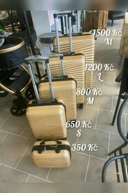 Nové cestovní kufry cena od 350 Kč - 1