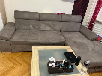 Rozkládací sedačka šedá s úložným prostorem
