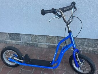 Dětská koloběžka.