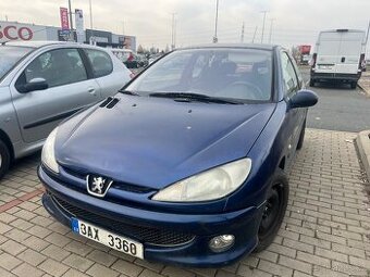 Peugeot 206 1.4i benzin  Najeto 199 tis.km. Klima, el.okna