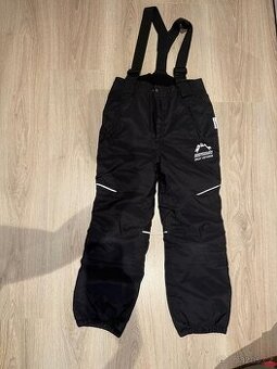 Oteplovací lyžařské kalhoty vel 134