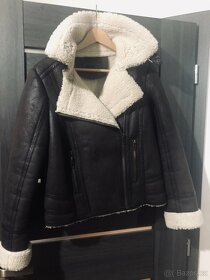 Prodám novou bundu 40-42 - 1