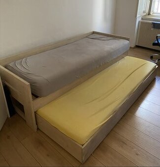 Postel s výsuvným lůžkem