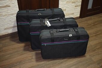 cestovní kufry,školní taška