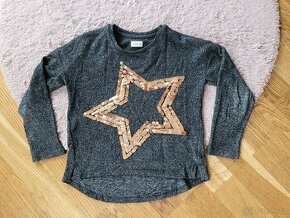 Slabý svetřík s flitry