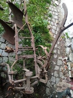 Pluh za kone nebo kravu