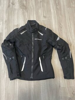 Dámské / pánské moto oblečení.