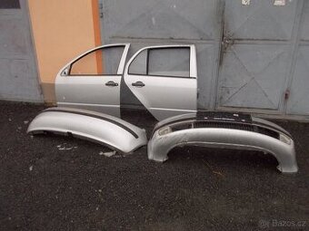 Dveře a nárazníky Škoda Fabia 9102