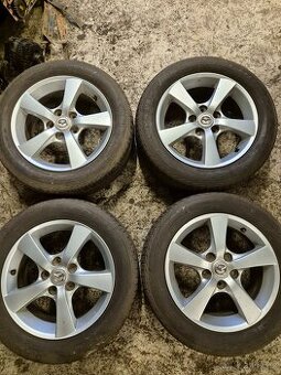 Orig.alu kola Mazda 5x114,3R16"Et-52,5