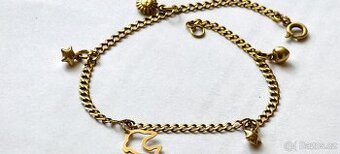 Zlatý náramek s přívěsky 585/1000. 14K