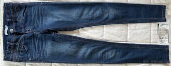 Dětské džíny zn. "Name it" vel. 11/146.