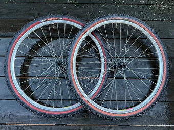 Zapletená kola Shimano LX / Rigida Laser 42 / IRC Mythos