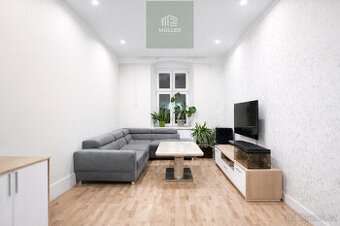 Pronájem prostorného bytu 3+1, 100 m² – centrum města, ulice