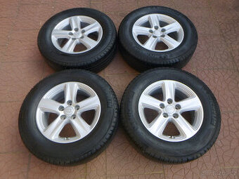 Celoroční alu kola originál Kia 5x114,3 6,5Jx16 ET36 / TPMS