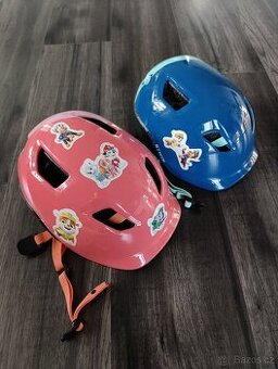 Dvě dětské cyklistické helmy 48-52, 53-56
