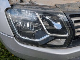 Dacia Duster 2013 - pravý přední světlomet