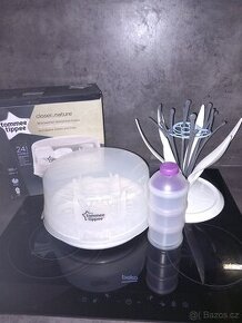 Parní sterilizátor, odkapávač na lahve Nuk a dávkovač mléka