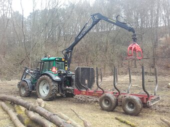 Valtra C100 + hydraulická ruka, kácecí hlavice, vyvážečkou