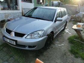 Mitsubishi Lancer 1.6i (72kw) - Na nahradni dily