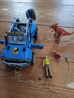 Schleich dinosaurus, terénní vůz a panacek