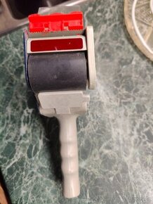 Ruční odvíječ lepící pásky