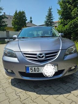 Mazda 3 sedan 1.6 77 kW