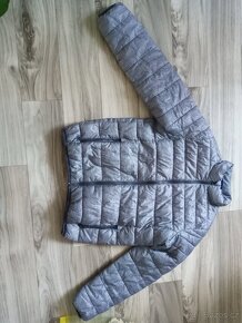 Prodám zimní bundu.Velikost 140. - 1