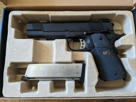 M.E.U. SOC (celokov, blowback) + 3D pouzdro + kuličky