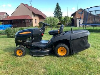 Traktor na sečení Partner.