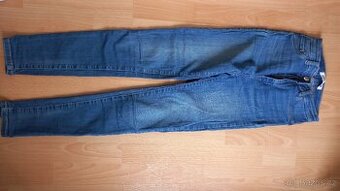 Modré rifle zn. Tally Weijl , vel. 38 hodně elastické