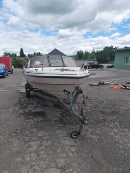 Motorový člun FIBERLINE G 16+  Johnson 70PS + přívěs