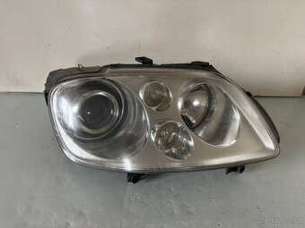 VW Caddy Touran světlomet xenon 1T0941032D komplet