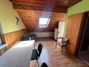 1+1 v domě se zahradou v Krči