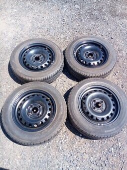 Sada kol 4x100, ET 35 vč. pneu Falken 165/70 R 14