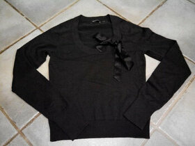 Dámský elegantní svetr se stuhou