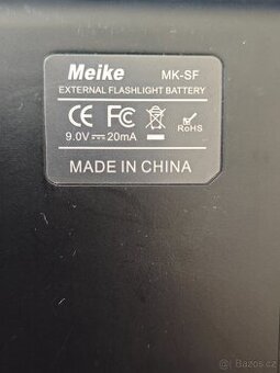 Přídavný zdroj k bleskum Canon