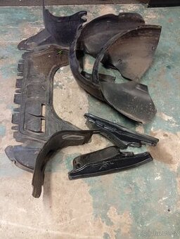 Prodám spodní část krytu motoru,přední podběhy na VW golf 5