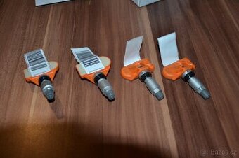 Sada 4ks NOVÉ ORIG.čidla tlaku TPMS + ventilky