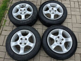 4x alu disky 4x100 R14, letní pneu 70%