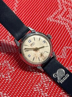 Hodinky Prim pavouček – modré indexy + řemínek Saturn Sport