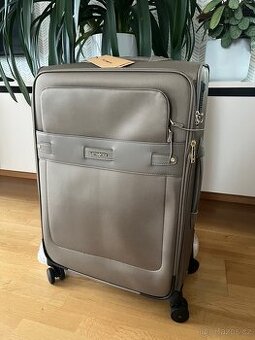 Nový středně velký kufr Samsonite
