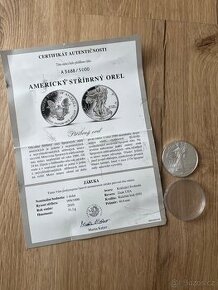 Stříbrná mince s puncem a dokladem autentičnosti