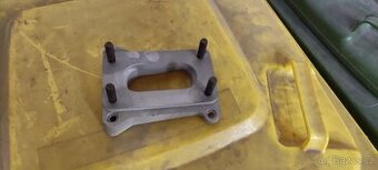 Mezikus karburátoru Škoda